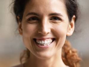 Woman smiling.